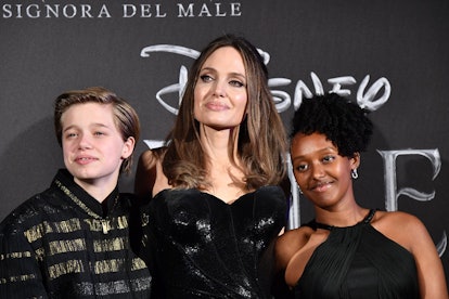 US actress Angelina Jolie (C) poses with her children Shiloh Nouvel Jolie-Pitt (L) and Zahara Marley...