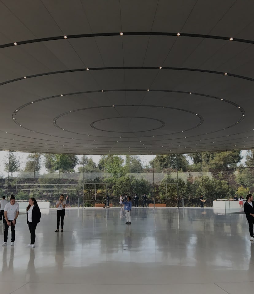 Tech journalists gather at the Steve Jobs Theater before the first-ever product launch at the new Ap...