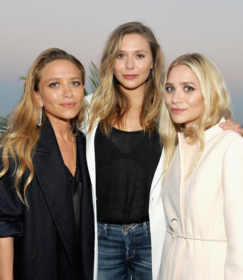 LOS ANGELES, CA - JULY 26: (L-R) Designer Mary-Kate Olsen, actress Elizabeth Olsen and designer Ash...