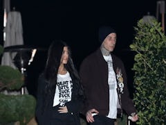 MALIBU, CA - MARCH 19: Kourtney Kardashian and Travis Barker are seen at Nobu on March 19, 2021 in M...