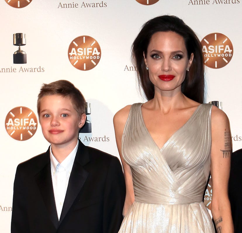 LOS ANGELES, CA - FEBRUARY 03:  Shiloh Nouvel Jolie-Pitt (L) and mother actress Angelina Jolie atten...