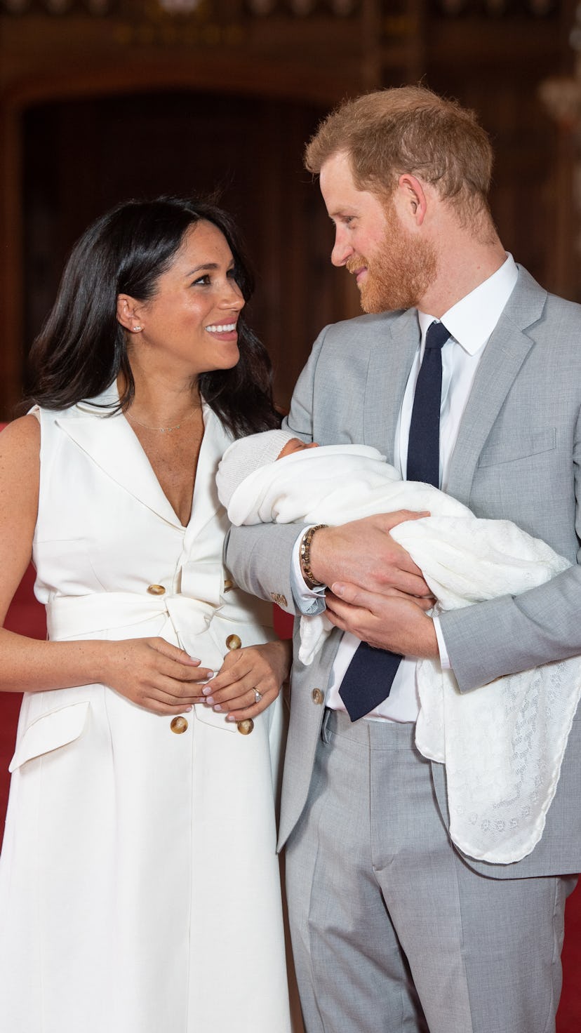 WINDSOR, ENGLAND - MAY 08: Prince Harry, Duke of Sussex and Meghan, Duchess of Sussex, pose with the...