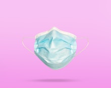 Covid-19 face mask on color background