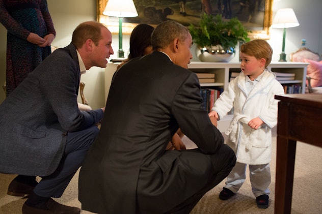 Prince George greeted Barack Obama in his robe.