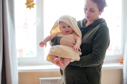 mother holding her baby