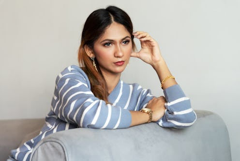 woman daydreaming from the couch