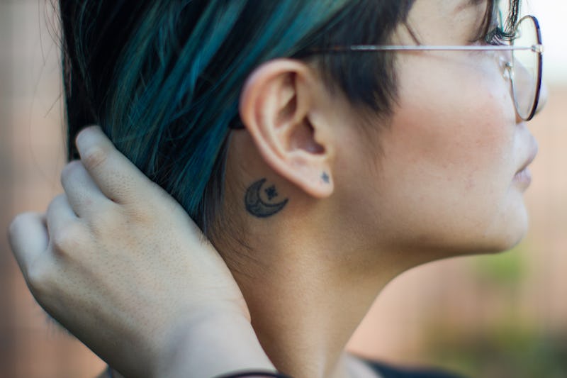 Want a tattoo that you can keep under wraps? Consider getting a piece of new ink behind your ear lik...