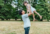 These Father's Day quotes will make your dad's face light up the way that this dad who is holding up...