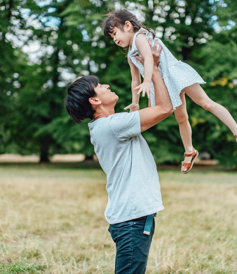 These Father's Day quotes will make your dad's face light up the way that this dad who is holding up...