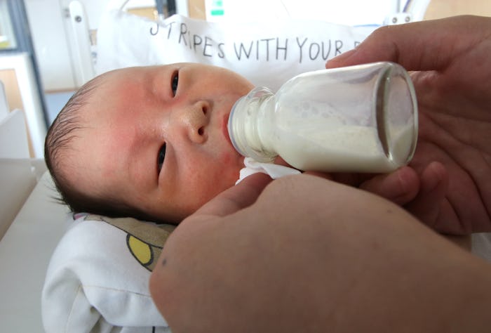 HEBEI, CHINA - MAY 10: (CHINA MAINLAND OUT)The "deputy mothers" are taking care of newborn child in ...