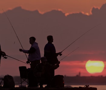 SEVASTOPOL, RUSSIA - MAY 29, 2021: Anglers at Apollo Bay at sunset. Sergei Malgavko/TASS (Photo by S...