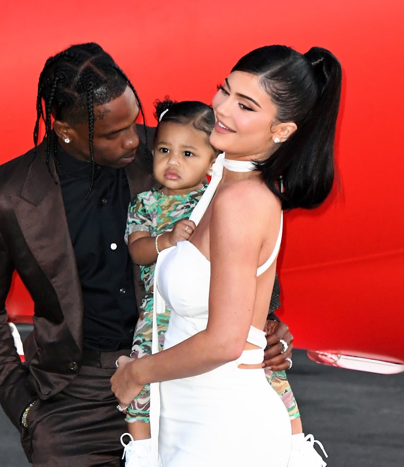 SANTA MONICA, CALIFORNIA - AUGUST 27: (L-R) Travis Scott, Stormi Webster, and Kylie Jenner attend th...