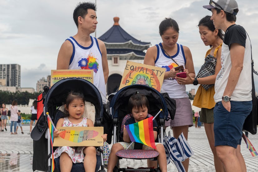 Family at an LGBT Pride Parade.