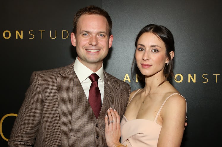 BEVERLY HILLS, CALIFORNIA - JANUARY 05: Actors Patrick J. Adams (L) and Troian Bellisario (R) attend...
