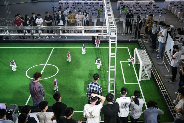 TIANJIN, CHINA - MAY 21: Robot soccer players compete in a soccer game during the 2021 RoboCup China...
