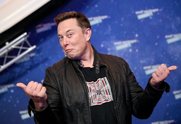 SpaceX owner and Tesla CEO Elon Musk poses as he arrives on the red carpet for the Axel Springer Awa...