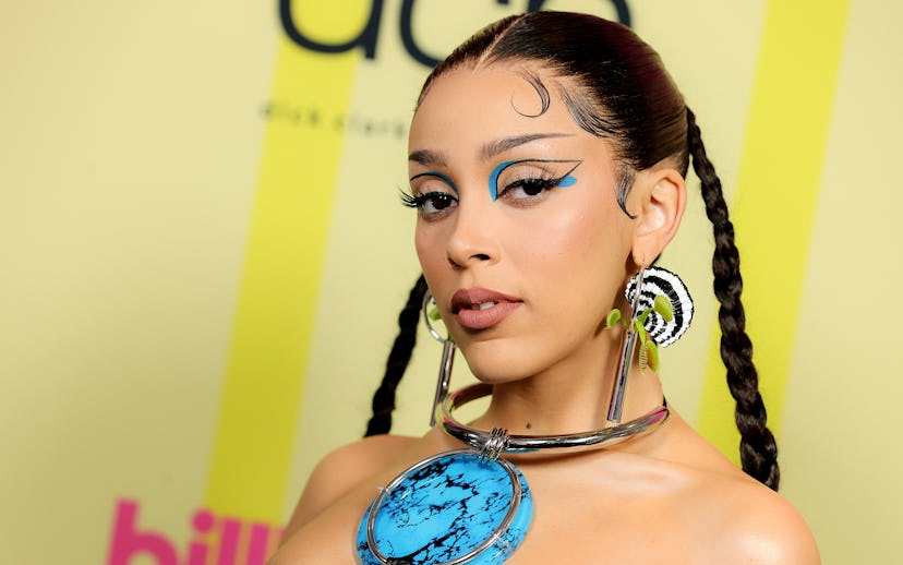 LOS ANGELES, CALIFORNIA - MAY 23: In this image released on May 23, Doja Cat poses backstage for the...
