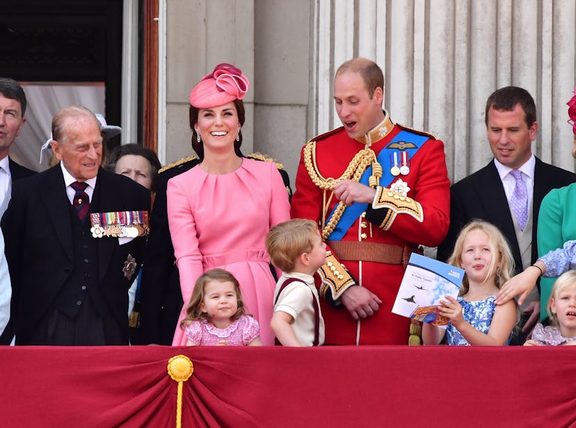 Prince Philip gets a kick out of his great-grandchildren.