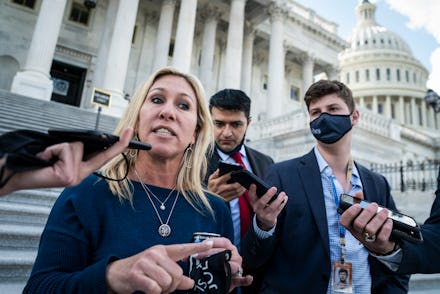 WASHINGTON, DC - MAY 13: Rep. Marjorie Taylor Greene, R-Ga., walks out after a vote speaking with re...