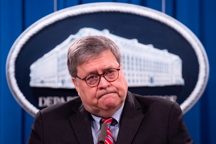 US Attorney General William Barr looks on during a news conference to provide an update on the inves...