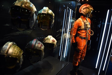 Helmets and suits of the 'Rebels' can be seen during a press tour in the exhibition 'Star Wars Ident...