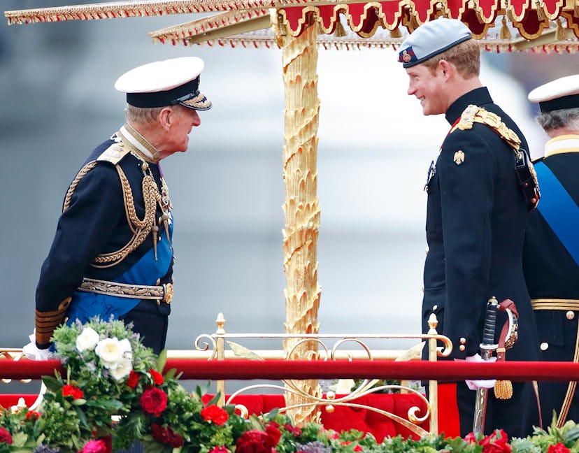 Prince Philip shares a laugh with Prince Harry.