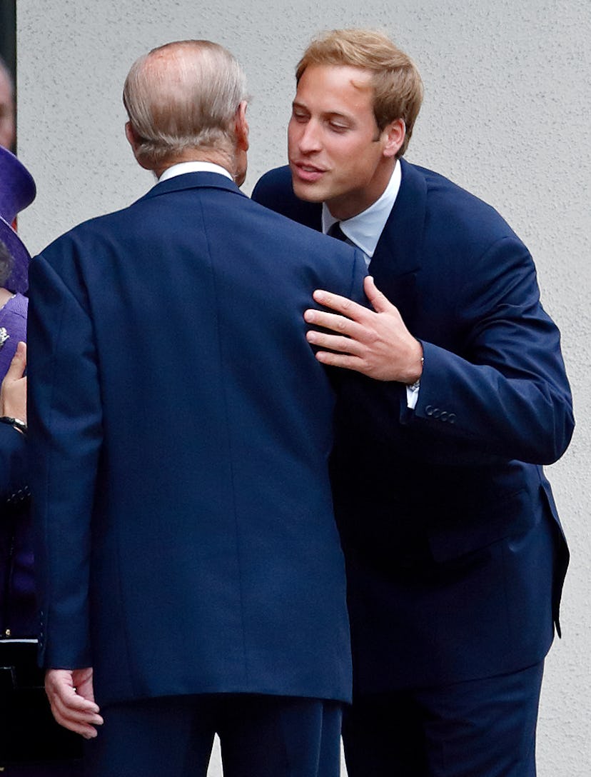 Prince William kisses his grandfather.