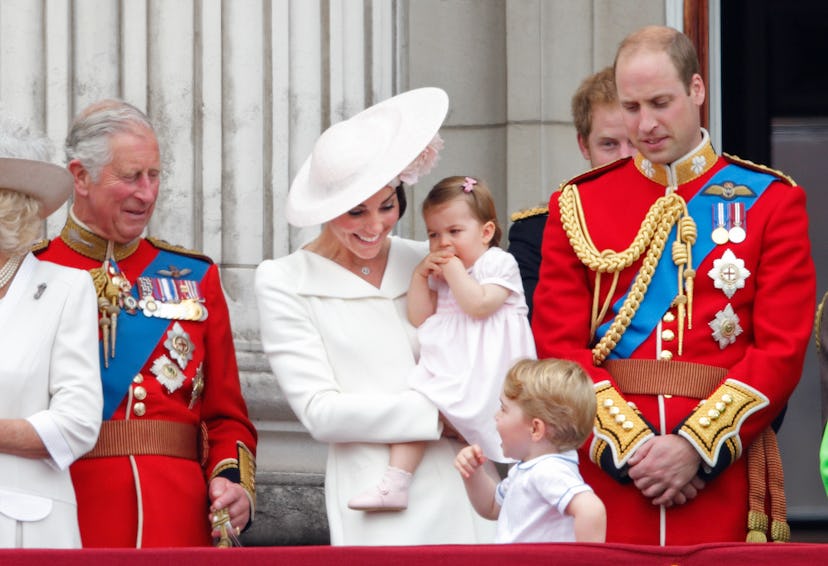 Prince George talks to grandpa Prince Charles.