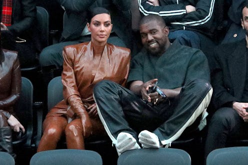 PARIS, FRANCE - MARCH 01: (EDITORIAL USE ONLY) Kim Kardashian and Kanye West attend the Balenciaga s...
