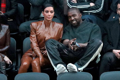 PARIS, FRANCE - MARCH 01: (EDITORIAL USE ONLY) Kim Kardashian and Kanye West attend the Balenciaga s...