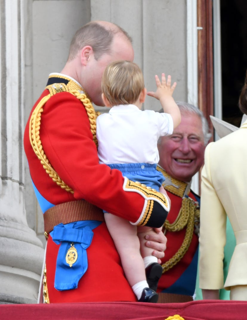 Prince Louis waves to his grandfather.