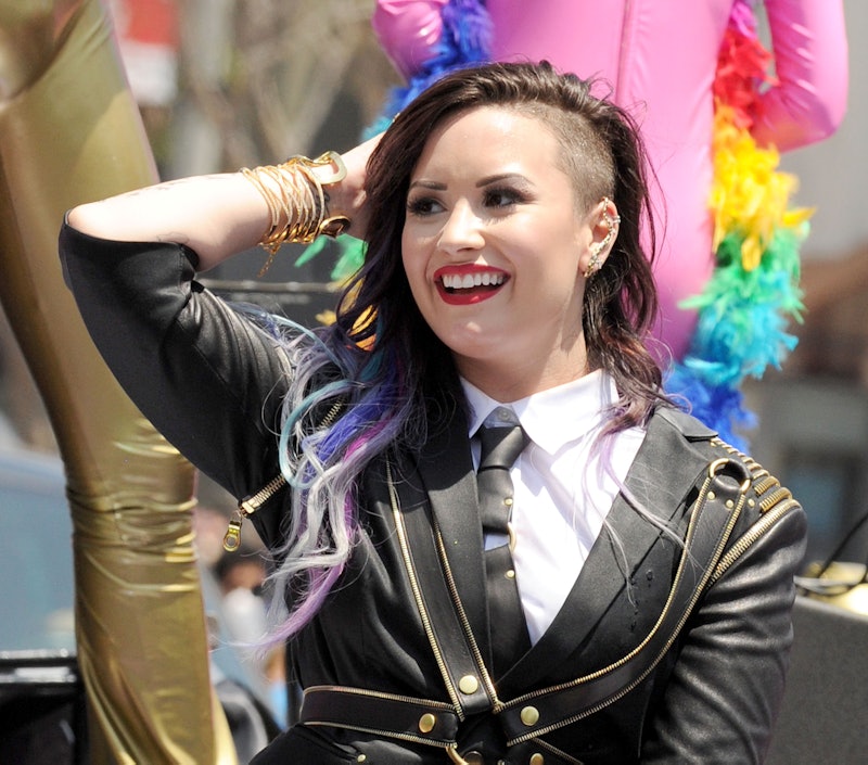 Actress/singer Demi Lovato performs at the 2014 LA Pride Parade.