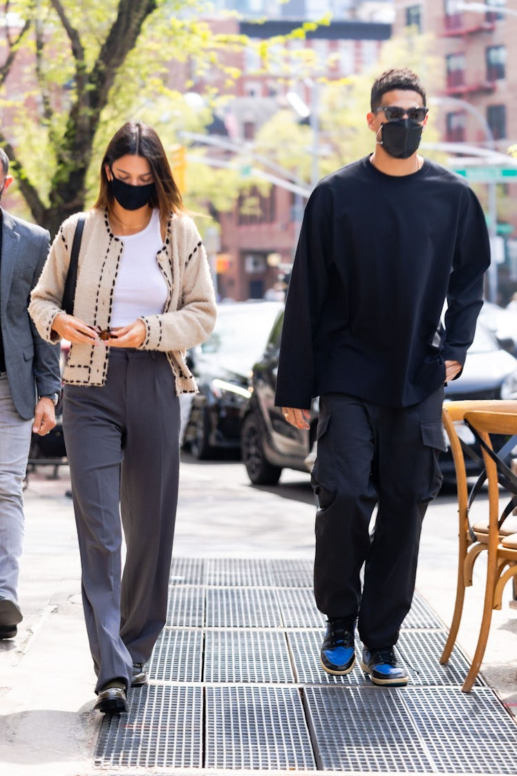Kendall Jenner and Devin Booker celebrated their one-year anniversary with Instagram pics.