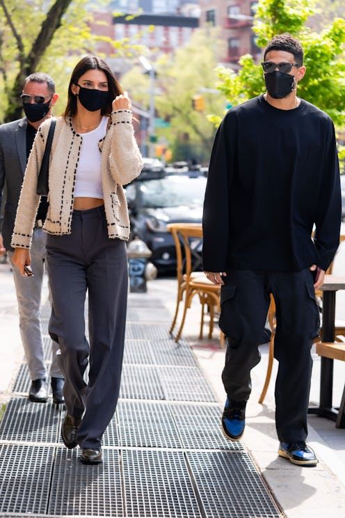 NEW YORK, NEW YORK - APRIL 24: Kendall Jenner (L) and Devin Booker are seen in SoHo on April 24, 202...