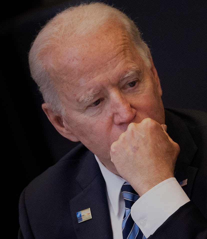 US President Joe Biden listens on at the start of a meeting of the North Atlantic Council at the Nor...