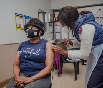 RANDFONTEIN, SOUTH AFRICA - JUNE 10: Sassafras's CEO, Ms Totsie Memela-Khambula receives her COVID-...