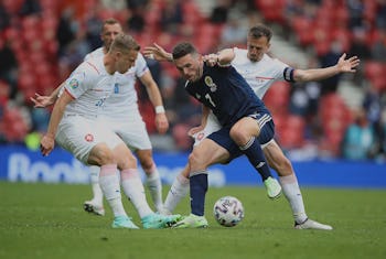 GLASGOW, SCOTLAND - JUNE 14: John McGinn of Scotland vies with Vladimir Darida of Czech Republic dur...