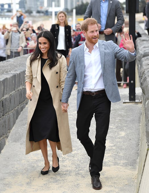 Meghan Markle wearing her Rothy’s flats while walking with prince harry and waving at the crowd