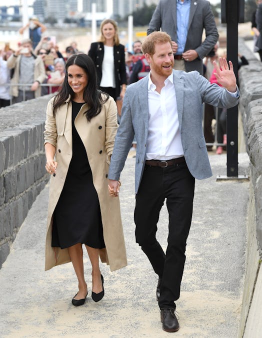 Meghan Markle wearing her Rothy's flats while walking with prince harry and waving at the crowd
