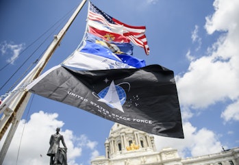 ST. PAUL, MN - MAY 22: A United States Space Force flag hangs from a pole, with flags of other armed service branches, outside the Minnesota State Capitol building on May 22, 2021 in St. Paul, Minnesota. Hold the Line Minnesota, a right wing conservative group, held a rally on the steps of the capitol today. (Photo by Stephen Maturen/Getty Images)