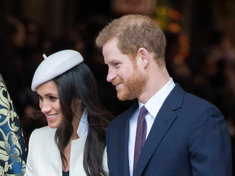 Meghan Markle's body language was "slightly possessive" when she started publicly dating Prince Harr...