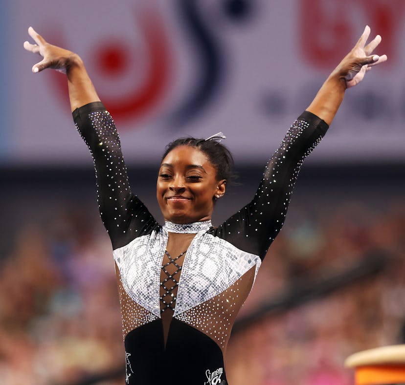 FORT WORTH, TEXAS - JUNE 06: Simone Biles reacts after compteting on the vault during the Senior Wo...
