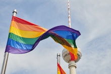 01 June 2021, Berlin: A rainbow flag flies in front of the TV tower. Four such colorful flags were h...