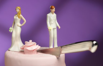 knife cutting between lesbian couple indicating separation and divorce