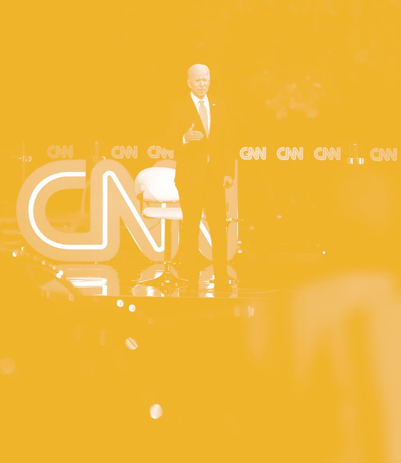 Democratic presidential candidate Joe Biden (L) speaks, alongside journalist Anderson Cooper, during...