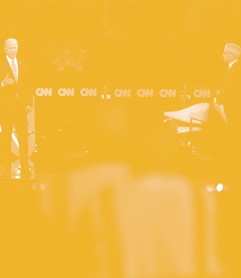 Democratic presidential candidate Joe Biden (L) speaks, alongside journalist Anderson Cooper, during...
