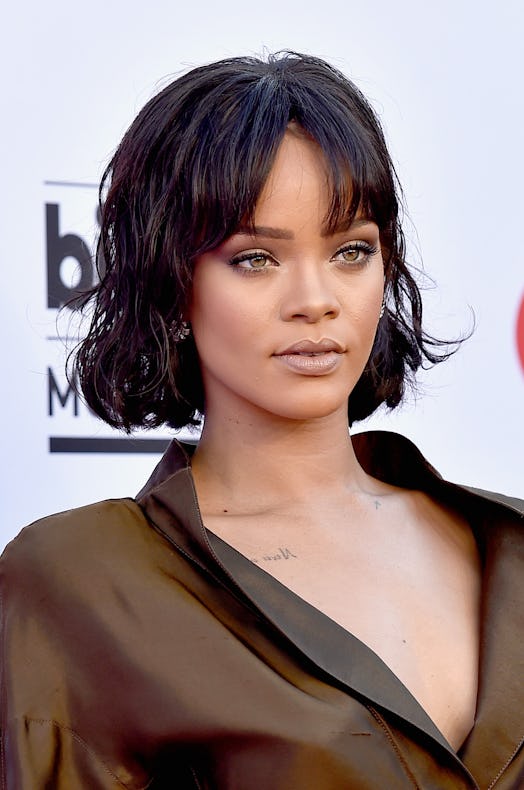 Rihanna shows how to wear curtain bangs with a short shaggy cut. 