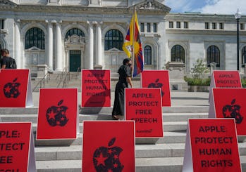 WASHINGTON, DC - JULY 30:  Tibetan activist Sonam takes part in a protest outside of the Apple Store...