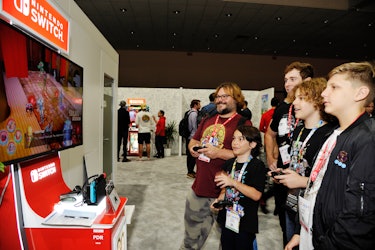 LOS ANGELES, CALIFORNIA - JUNE 12: Jack Black (L) and family check out 'Marvel Ultimate Alliance 3: The Black Order' for the Nintendo Switch system during the 2019 E3 Gaming Convention at Los Angeles Convention Center on June 12, 2019 in Los Angeles, California. (Photo by John Sciulli/Getty Images for Nintendo)