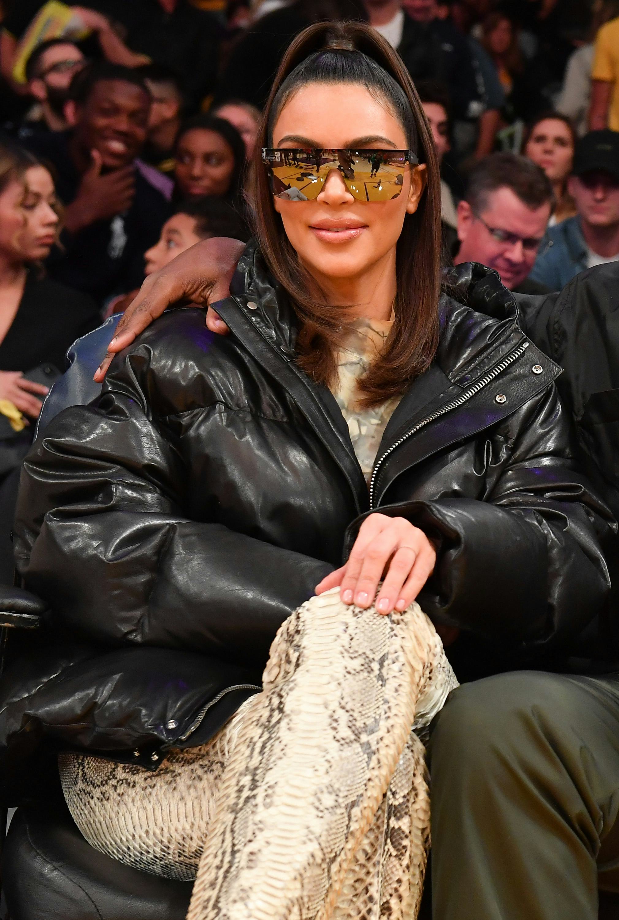 LOS ANGELES, CALIFORNIA - JANUARY 13: Kim Kardashian attends a basketball game between the Los Angel...